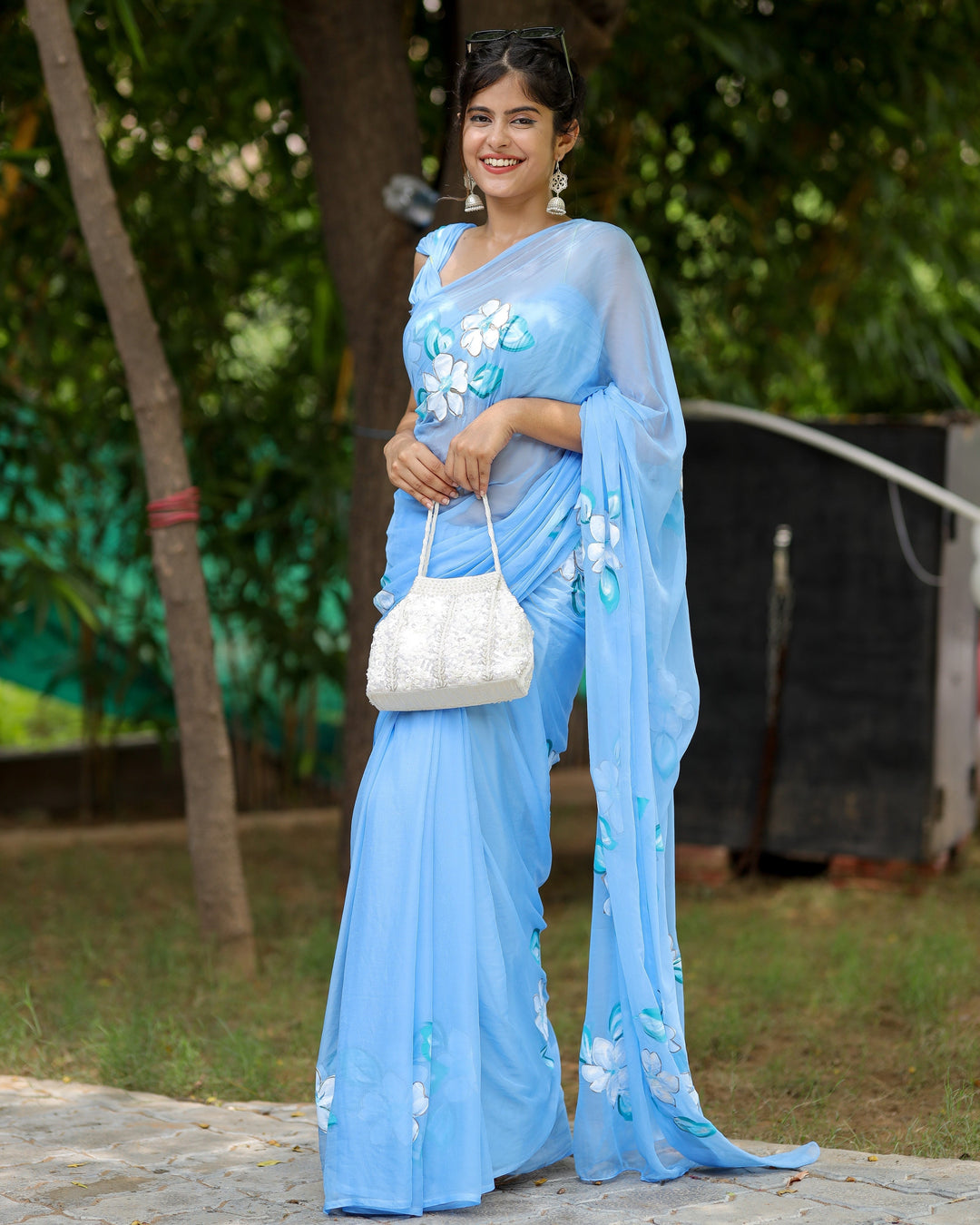 Sky Blue Georgette Saree with Hand-Painted White Floral Motifs – Attached Blouse – 5.5 Meters