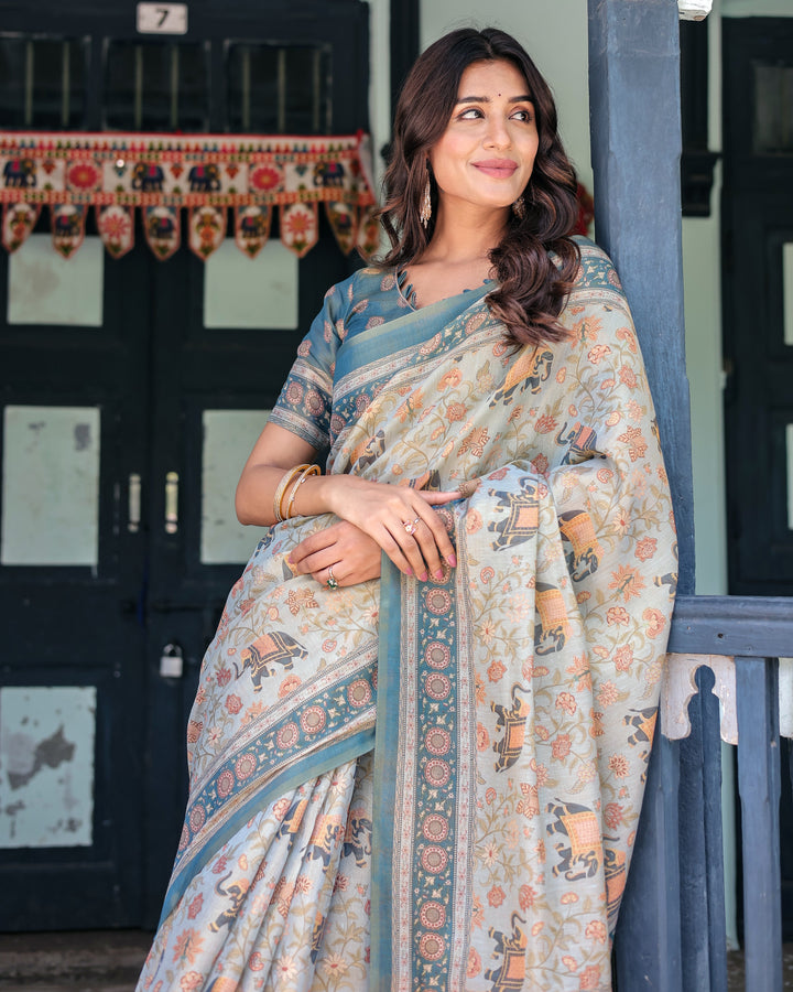Icy Blue Handloom Cotton Saree with Peach Elephant Motifs & Royal Procession Pallu