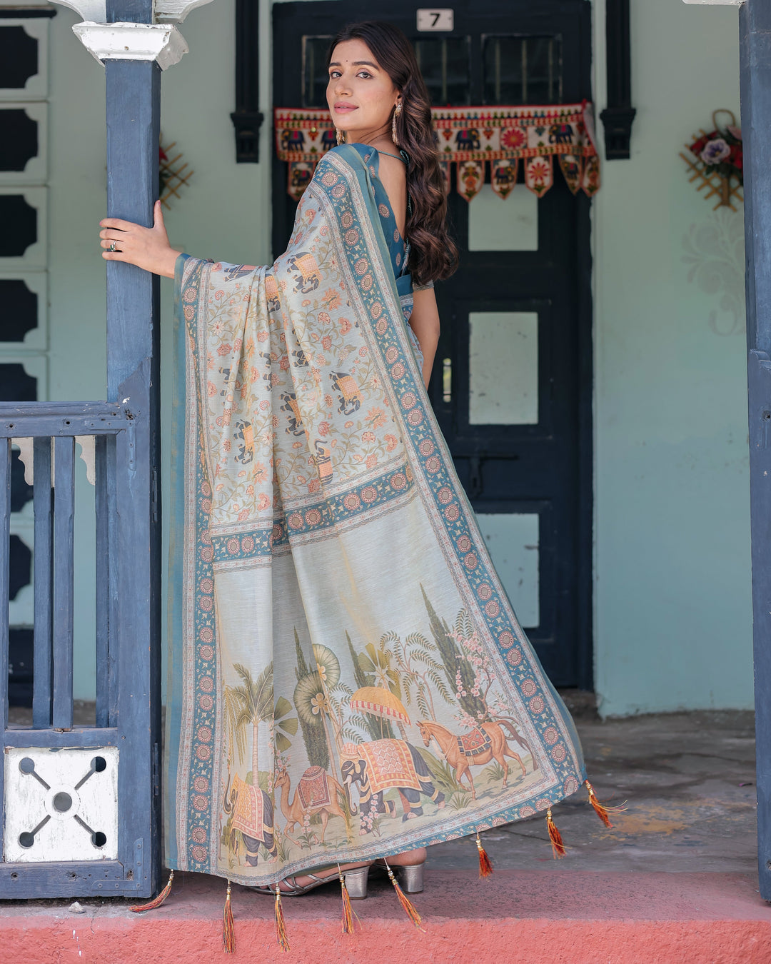 Icy Blue Handloom Cotton Saree with Peach Elephant Motifs & Royal Procession Pallu