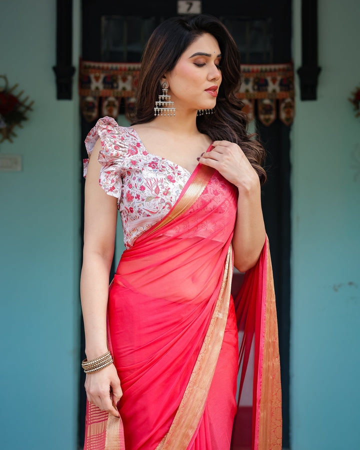 Vibrant Coral Pink Plain Chiffon Saree with Gold Zari Border Floral Ruffled Blouse & Tassel Detailing CHIFFON H 128-132