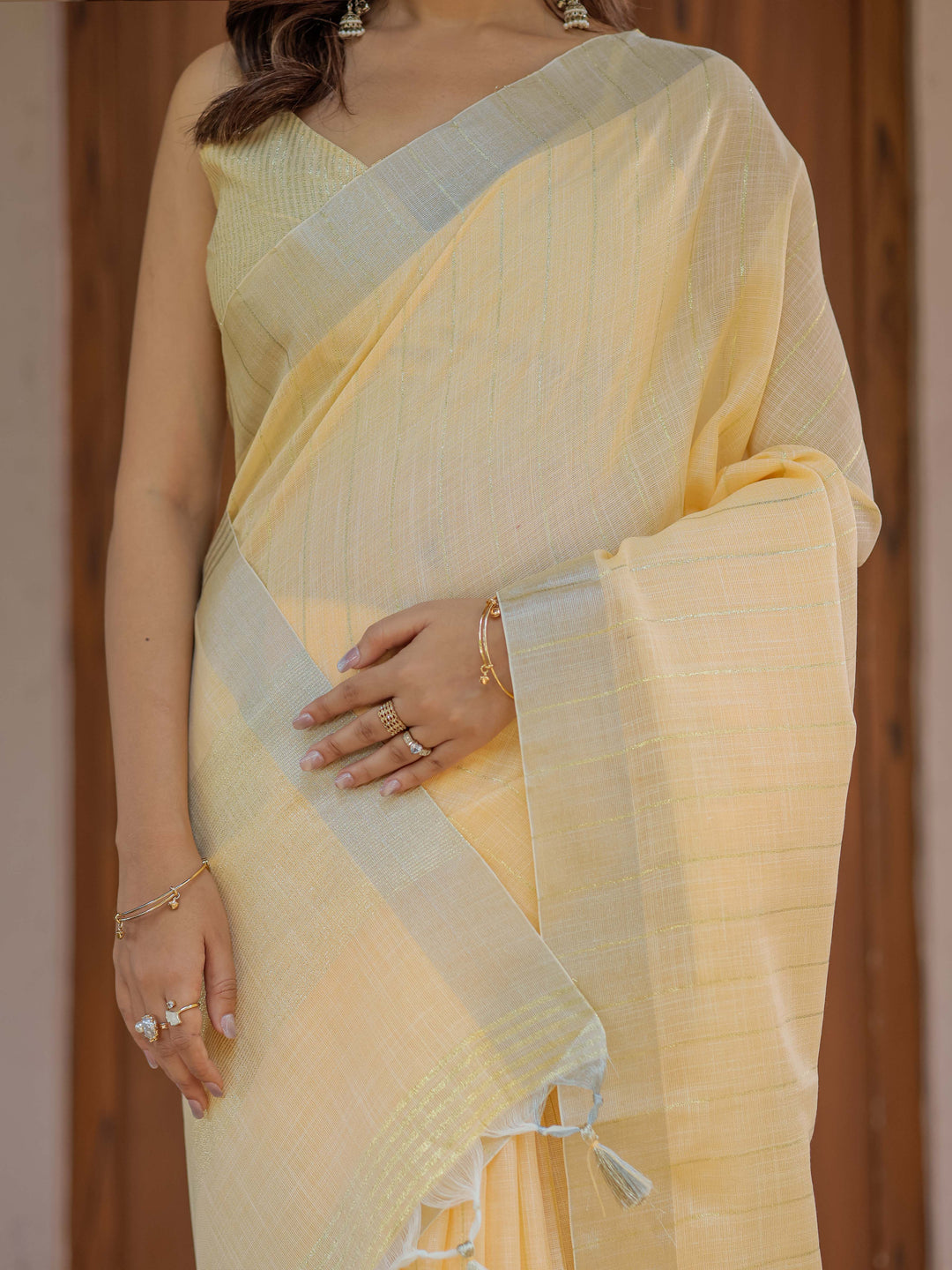 Butter Yellow Pure Handloom Cotton Saree with Golden Striped Weaving & Tassel Detailing