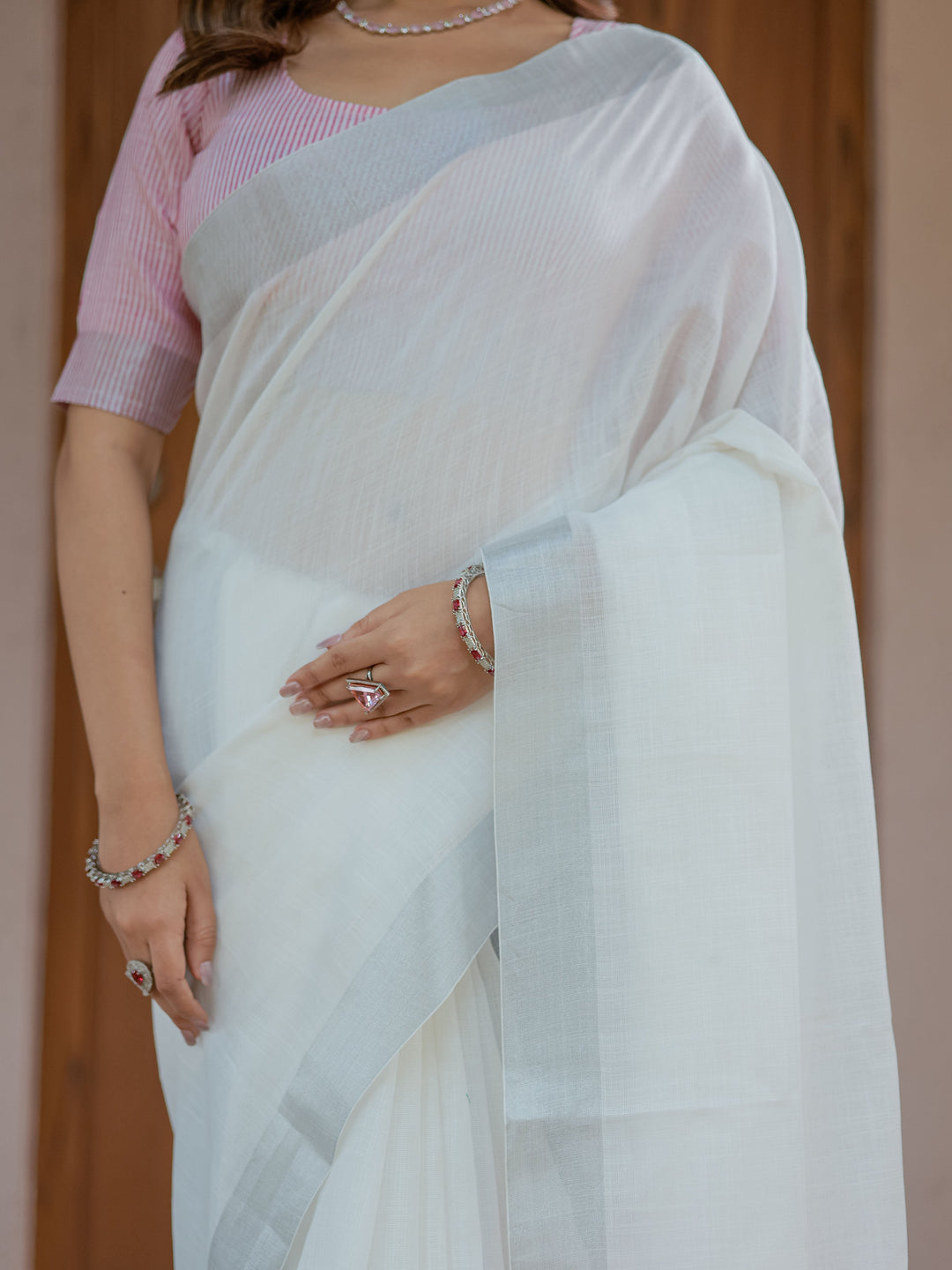 Pure White & Blush Pink Handloom Cotton Saree with Minimal Striped Border & Tassel Detailing