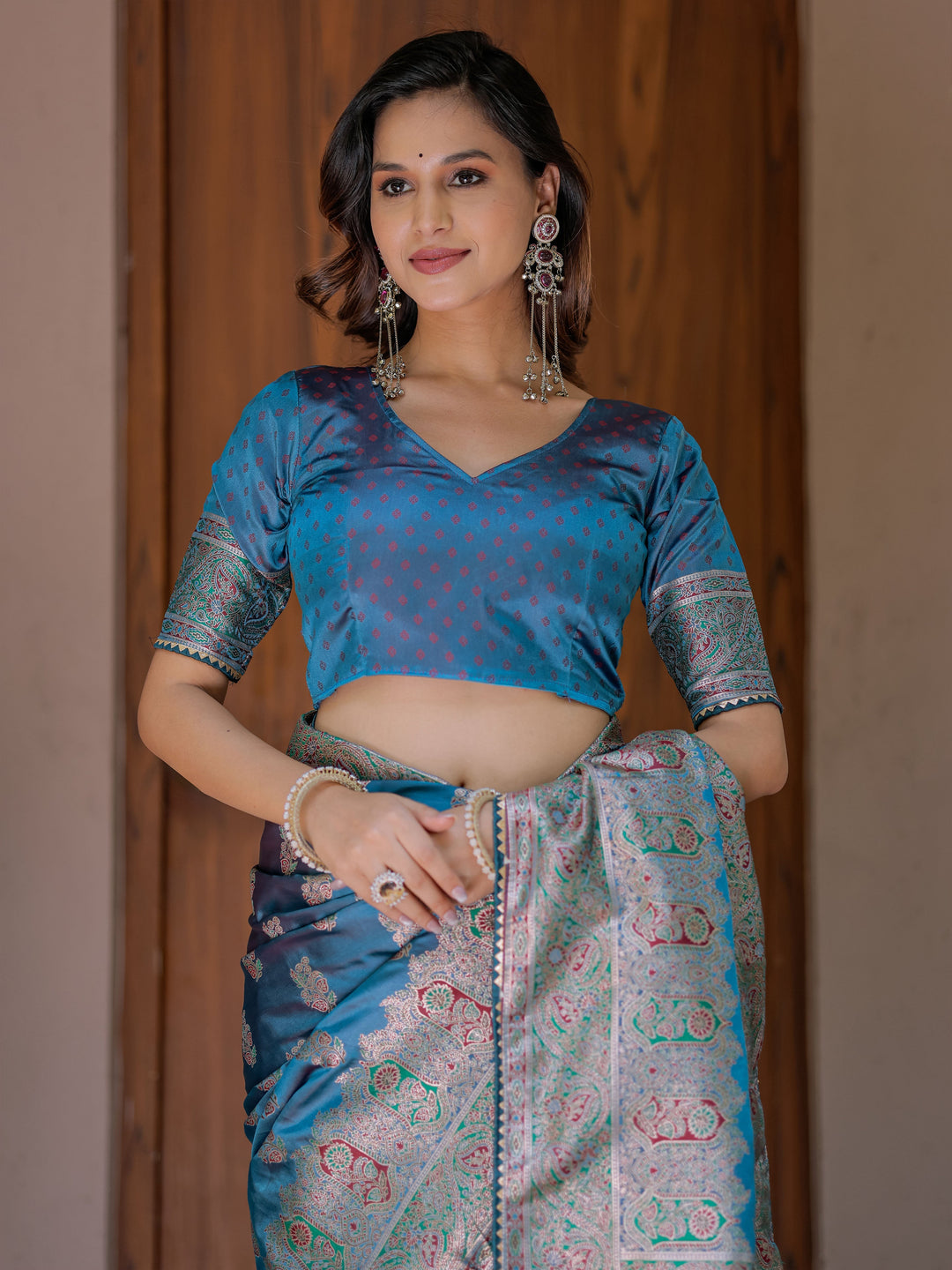 Royal Teal Blue Banarasi Silk Saree with Intricate Paisley Zari Weaving & Tassel Detailing