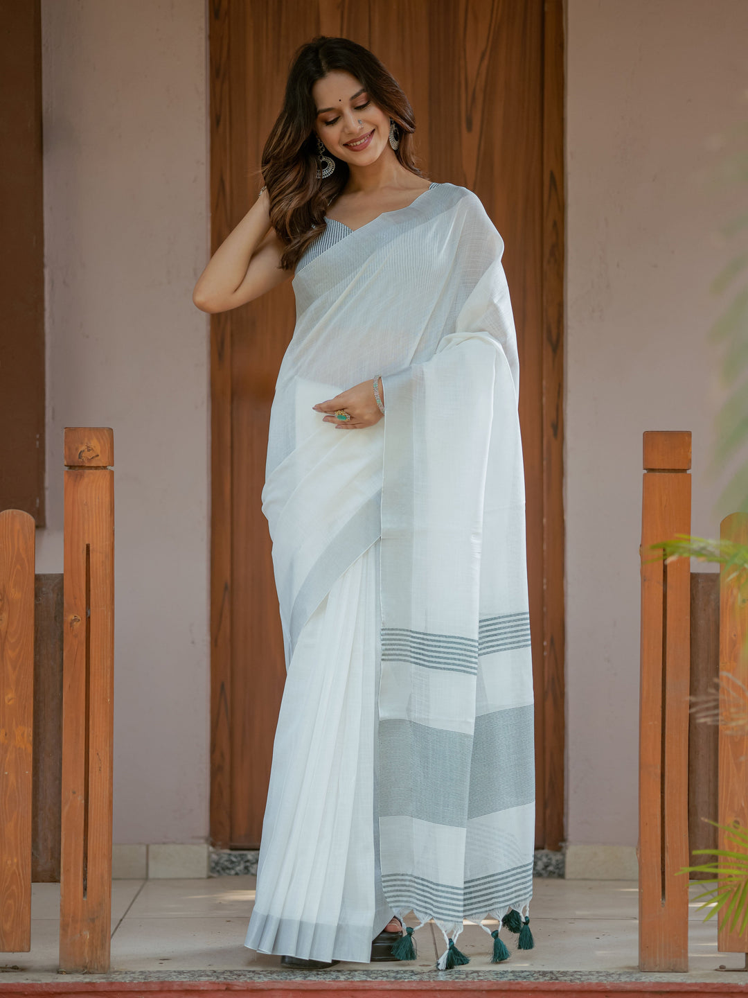 Pure White & Teal Blue Handloom Cotton Saree with Minimal Striped Border & Tassel Detailing