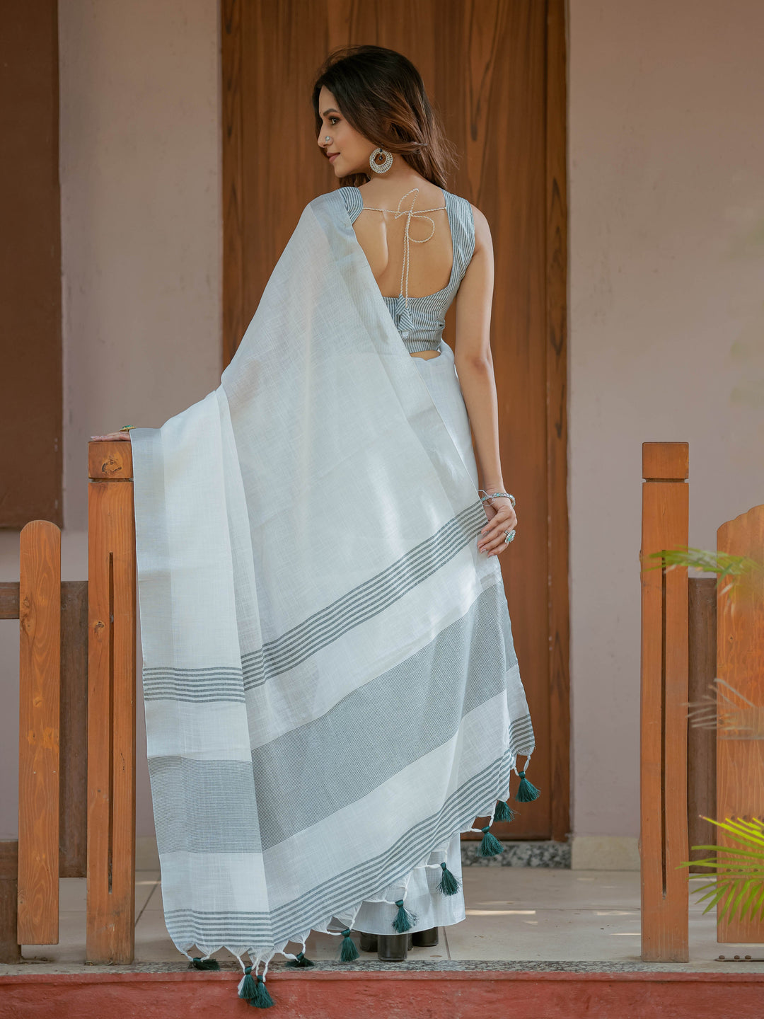 Pure White & Teal Blue Handloom Cotton Saree with Minimal Striped Border & Tassel Detailing