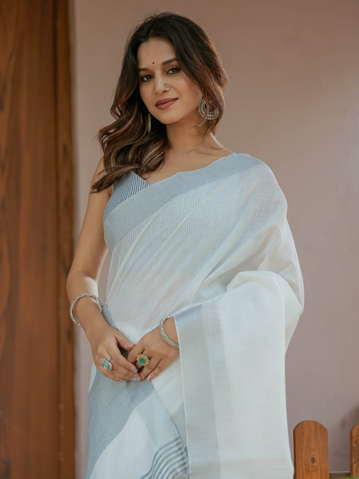 Pure White & Teal Blue Handloom Cotton Saree with Minimal Striped Border & Tassel Detailing