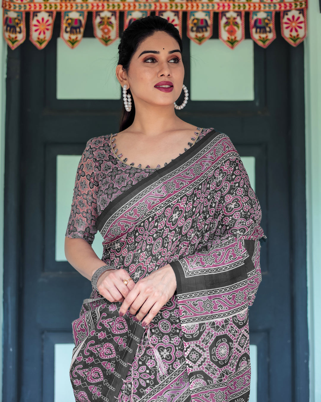 Black Pure Cotton Linen Saree with Pink Striped Pallu and Tassel Accents LINEN H 161170