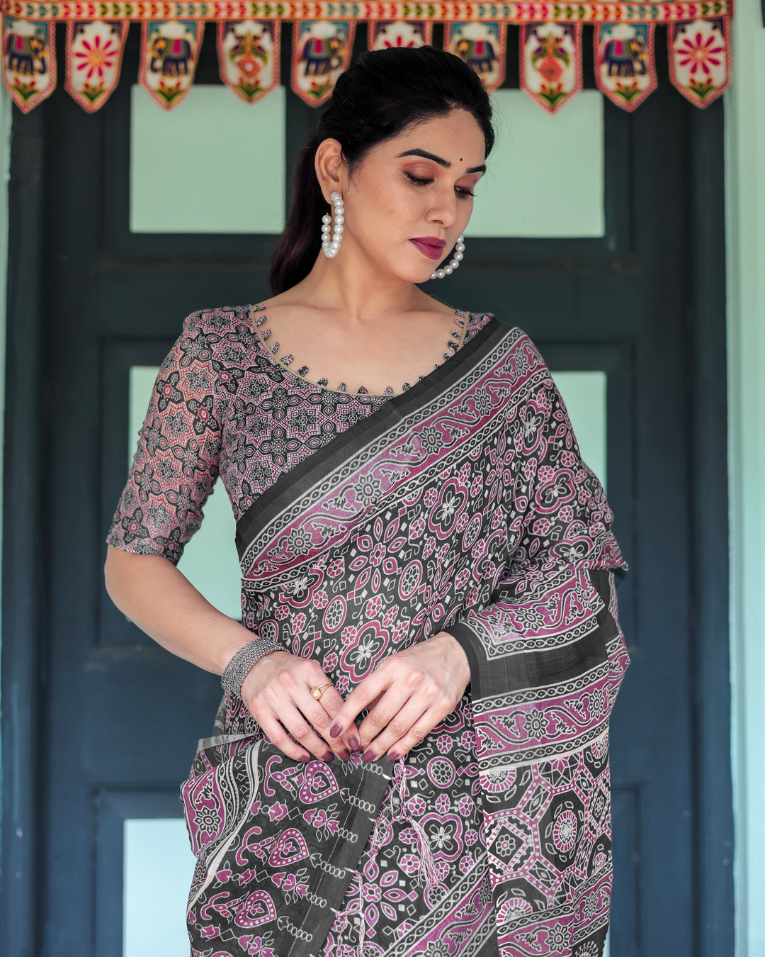 Black Pure Cotton Linen Saree with Pink Striped Pallu and Tassel Accents LINEN H 161170