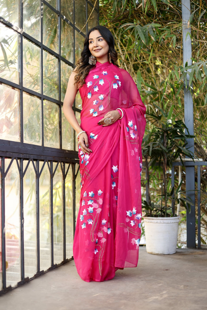 Rani Pink Georgette Saree with Hand-Painted Blue & White Bell Flowers – Attached Blouse – 5.5 Meters