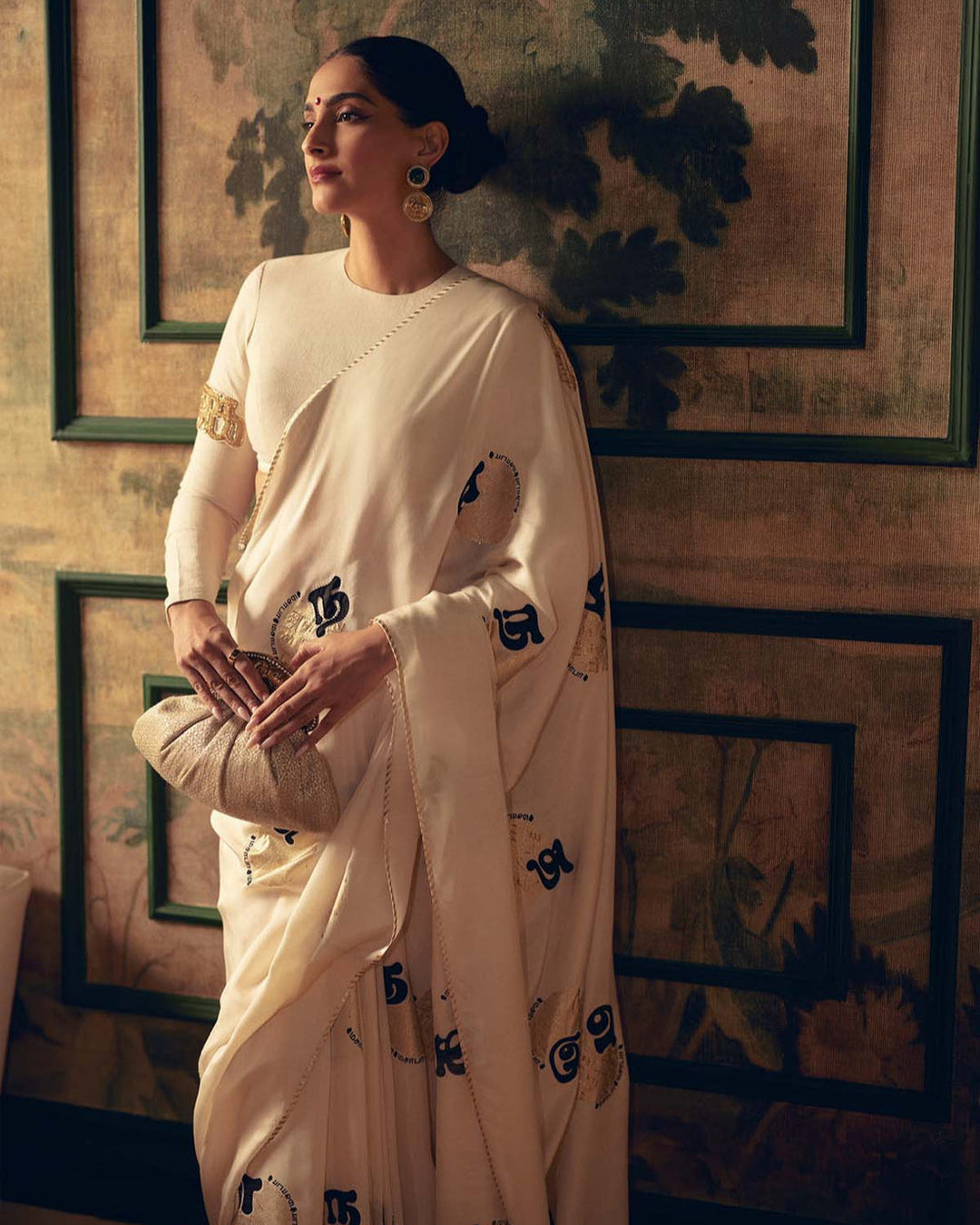 SONAM KAPOOR In Cream Satin Georgette Saree with Golden and Black Calligraphy Print