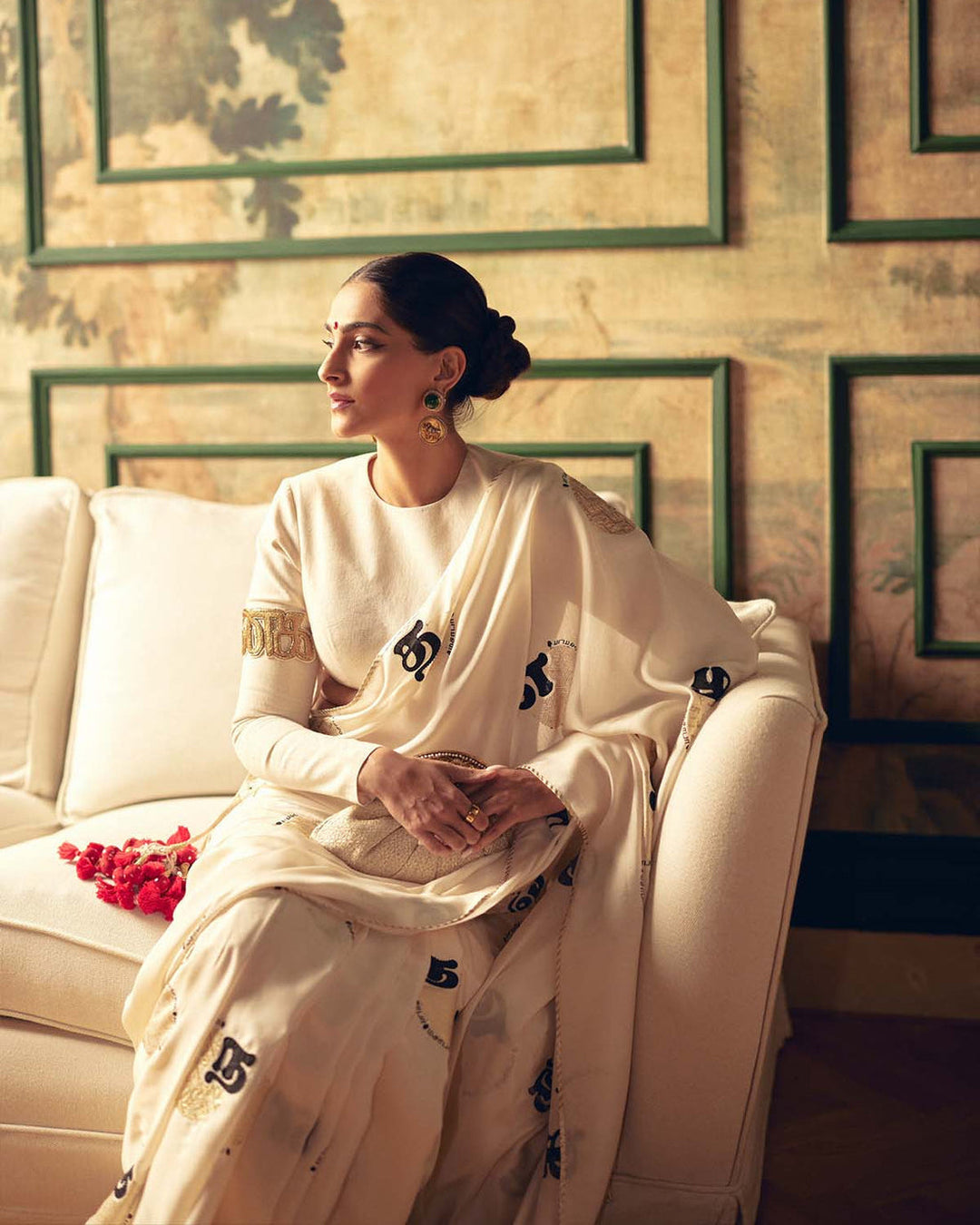 SONAM KAPOOR In Cream Satin Georgette Saree with Golden and Black Calligraphy Print