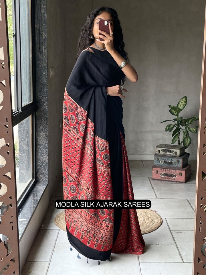 Black & Red Modal Silk Ajrakh Printed Saree with Heritage Border, Traditional Pallu & Tassel Detailing