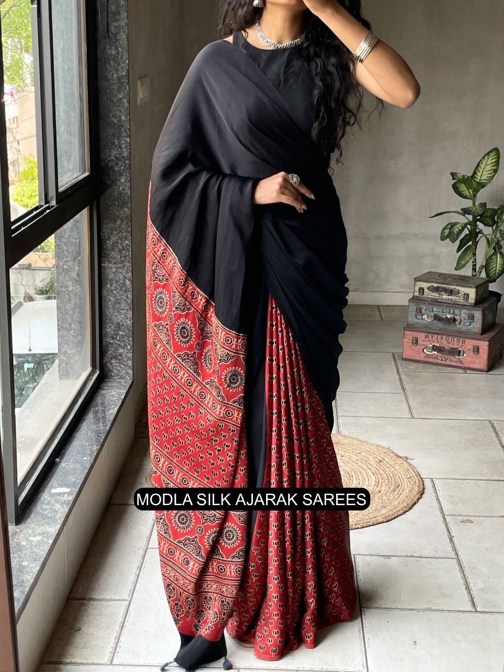 Black & Red Modal Silk Ajrakh Printed Saree with Heritage Border, Traditional Pallu & Tassel Detailing