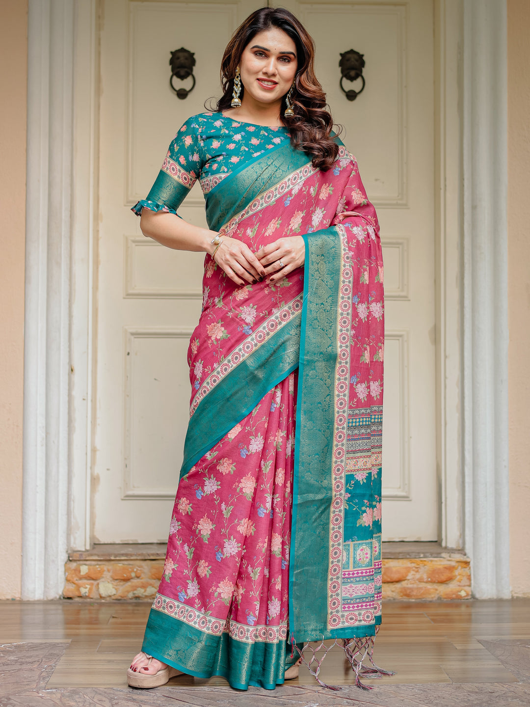 Rani Pink & Teal Green Floral Printed Saree with Rich Zari Border & Tassels – Festive Traditional Wear