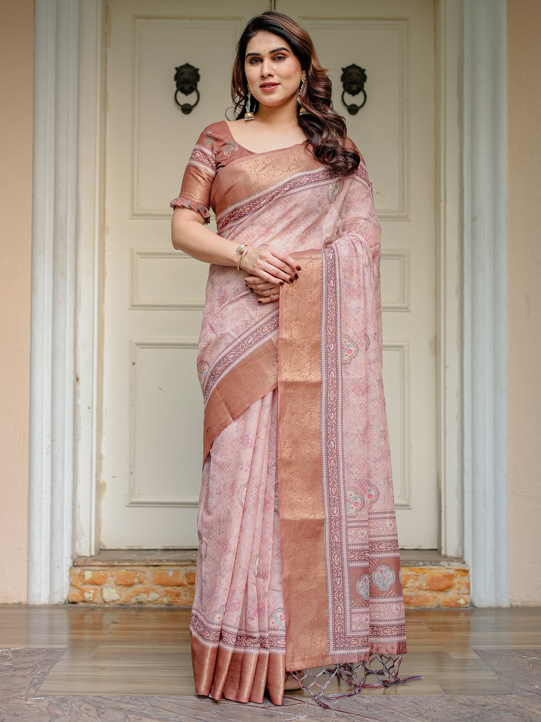 Dusty Peach & Copper Zari Woven Saree with Pastel Motifs & Tassels – Elegant Festive Traditional Wear