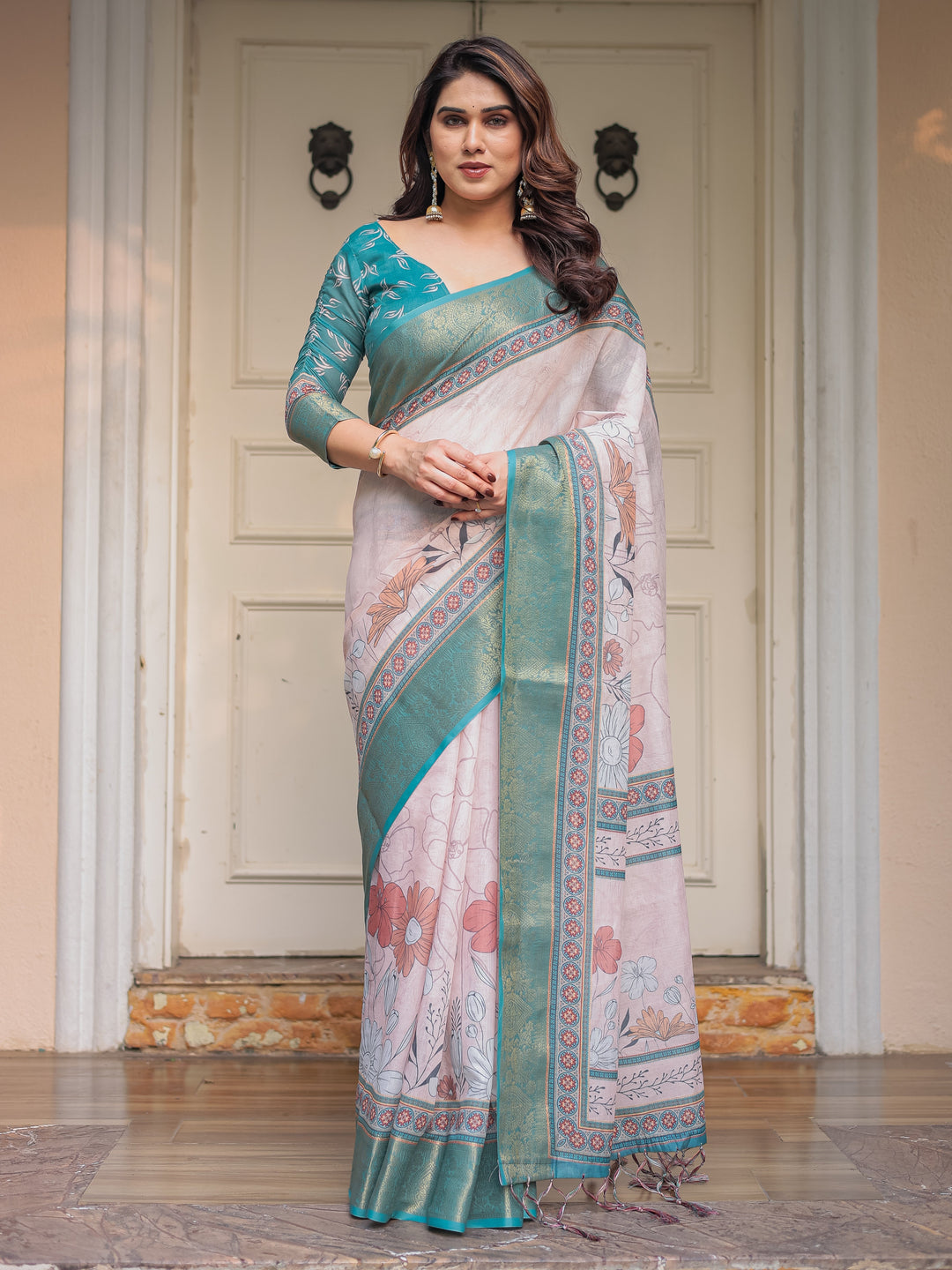 Pastel Lavender Floral Printed Saree with Teal Green Zari Border & Tassels – Elegant Festive Ethnic Wear