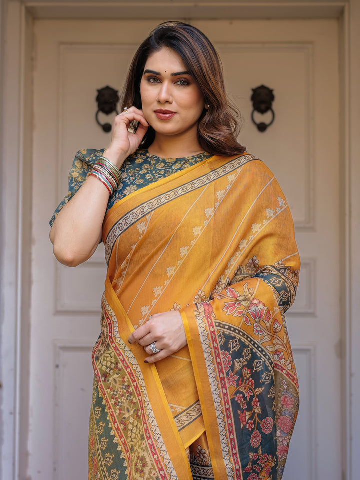 Mustard Yellow & Teal Green Floral Panel Printed Handloom Cotton Saree with Heritage Border & Tassels – Festive Traditional Wear