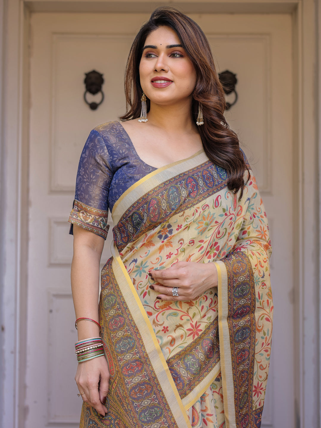 Cream & Navy Blue Floral Paisley Printed Handloom Cotton Saree with Heritage Border & Tassels – Festive Ethnic Wear