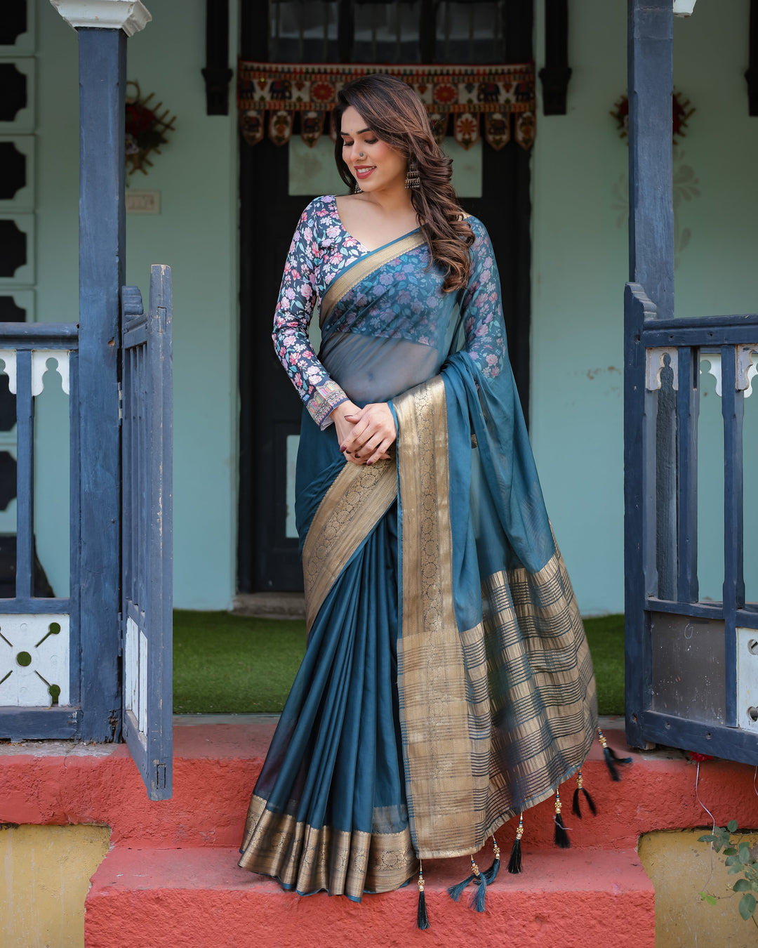 Teal Blue Plain Chiffon Saree with Gold Zari Border Floral Printed Blouse & Tassel Detailing CHIFFON H 128-132