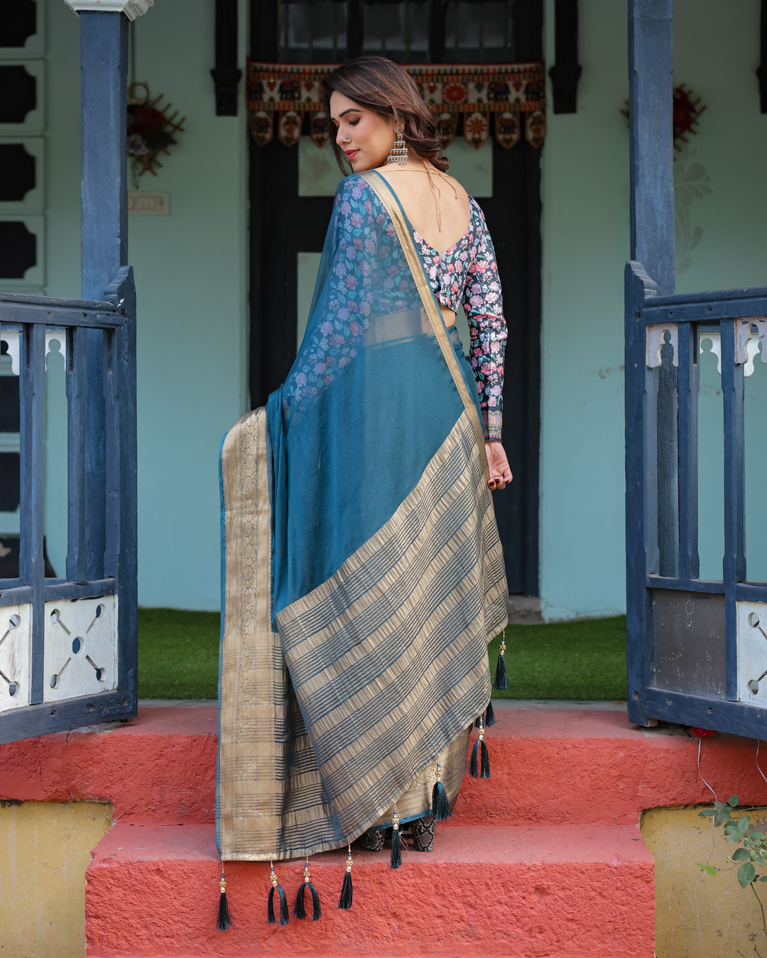 Teal Blue Plain Chiffon Saree with Gold Zari Border Floral Printed Blouse & Tassel Detailing CHIFFON H 128-132