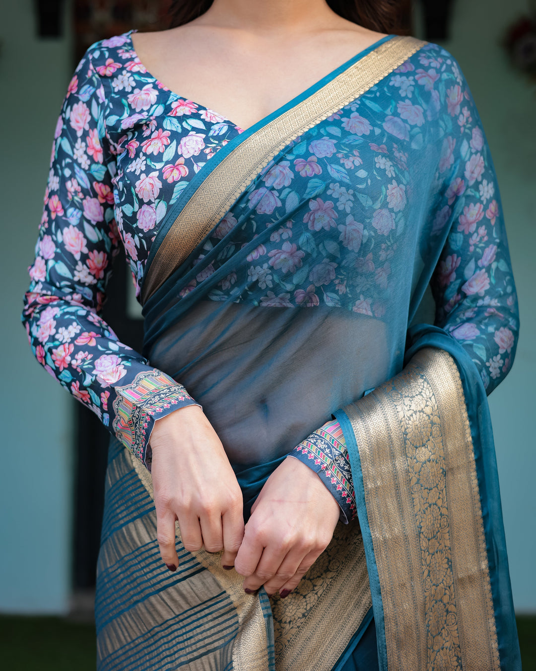 Teal Blue Plain Chiffon Saree with Gold Zari Border Floral Printed Blouse & Tassel Detailing CHIFFON H 128-132
