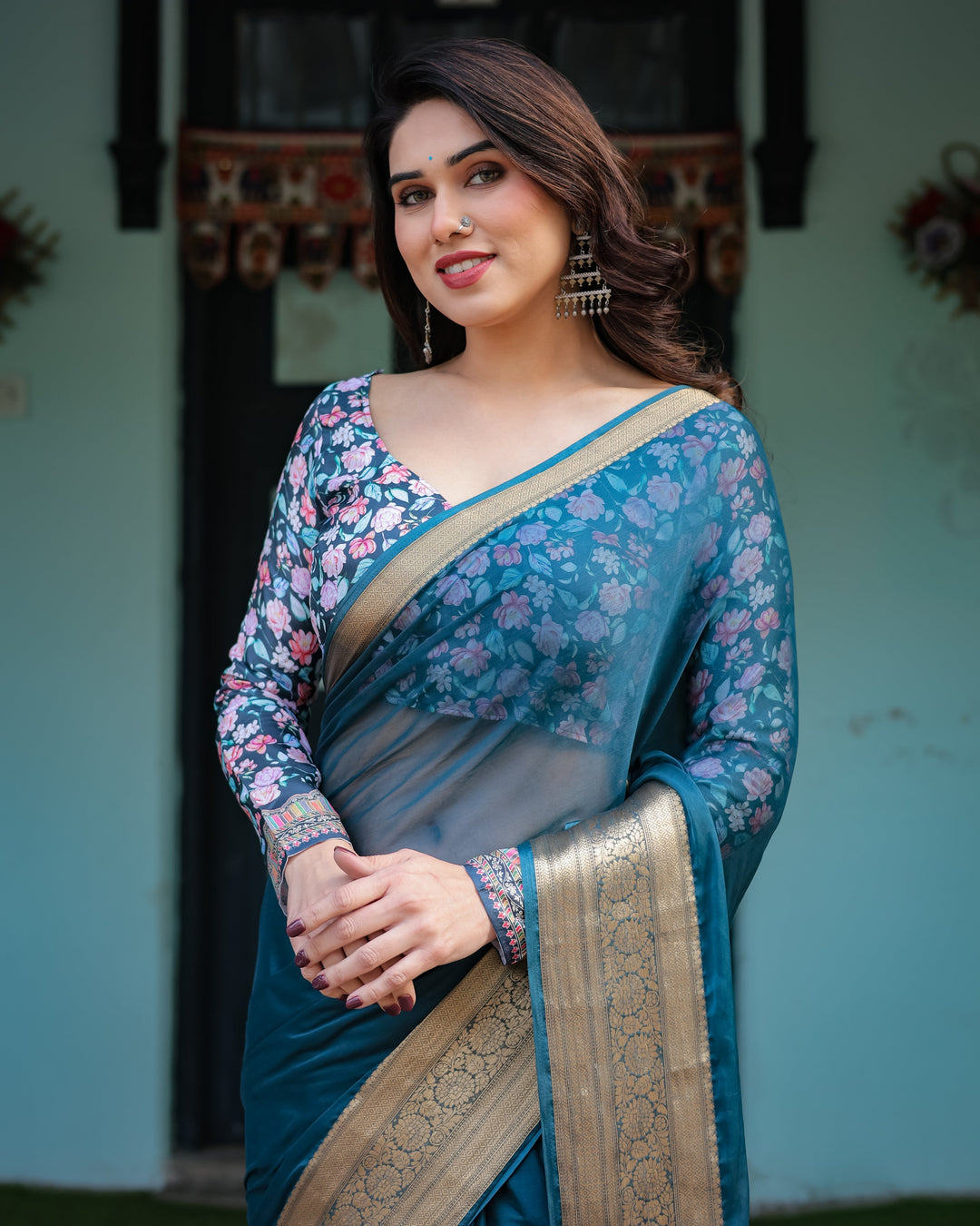 Teal Blue Plain Chiffon Saree with Gold Zari Border Floral Printed Blouse & Tassel Detailing CHIFFON H 128-132