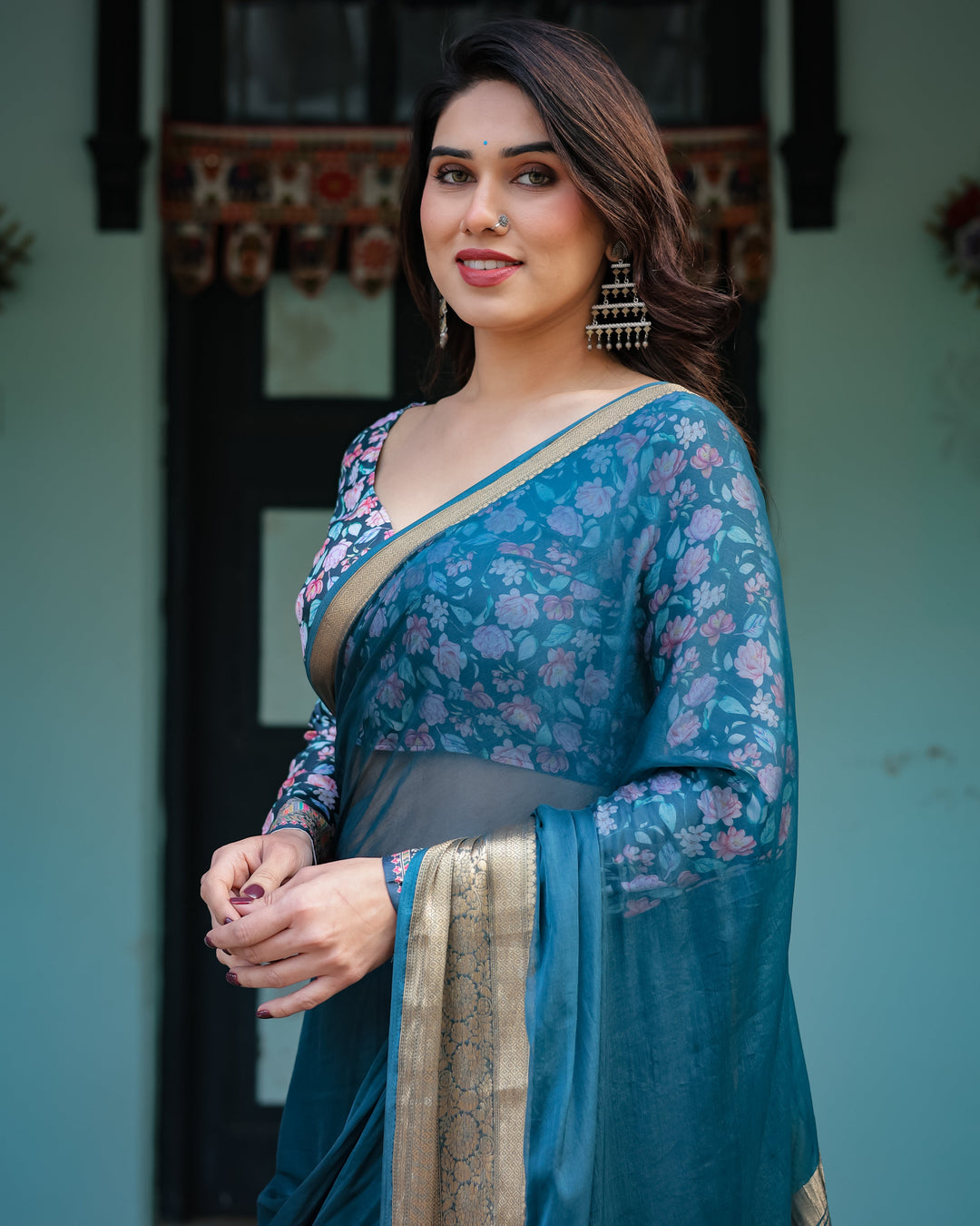 Teal Blue Plain Chiffon Saree with Gold Zari Border Floral Printed Blouse & Tassel Detailing CHIFFON H 128-132