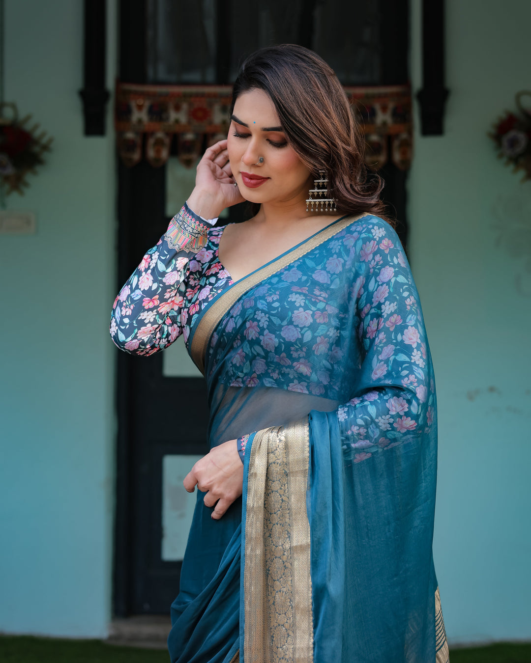 Teal Blue Plain Chiffon Saree with Gold Zari Border Floral Printed Blouse & Tassel Detailing CHIFFON H 128-132