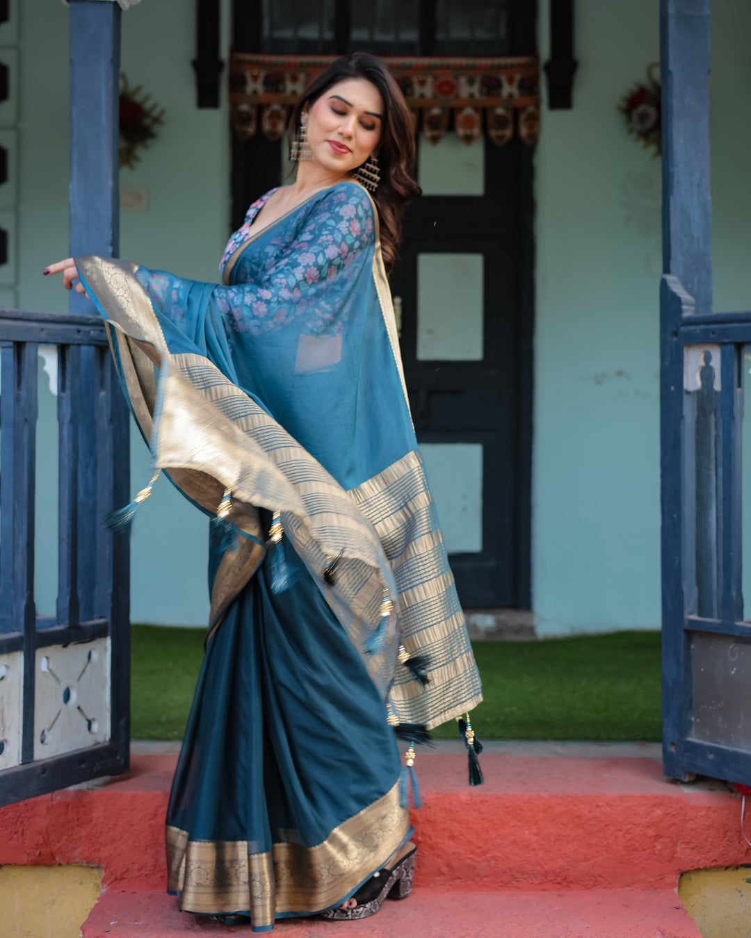 Teal Blue Plain Chiffon Saree with Gold Zari Border Floral Printed Blouse & Tassel Detailing CHIFFON H 128-132