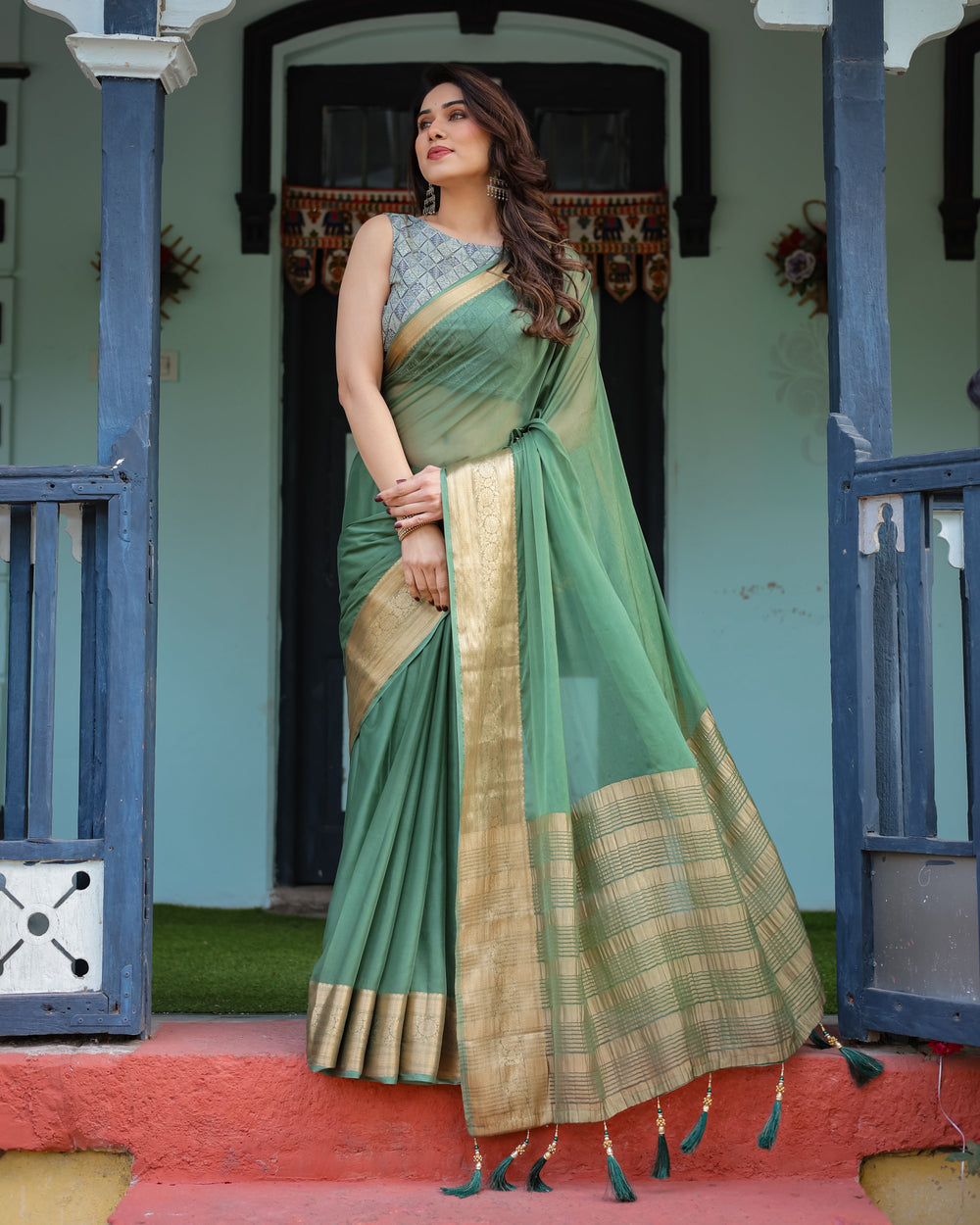 Mint Green Plain Chiffon Saree with Gold Zari Border Geometric Printed Blouse & Tassel Detailing CHIFFON H 128-132