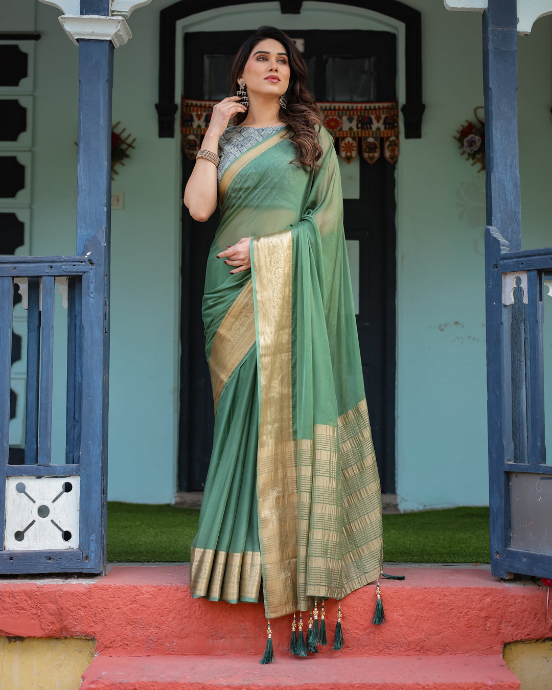 Mint Green Plain Chiffon Saree with Gold Zari Border Geometric Printed Blouse & Tassel Detailing CHIFFON H 128-132