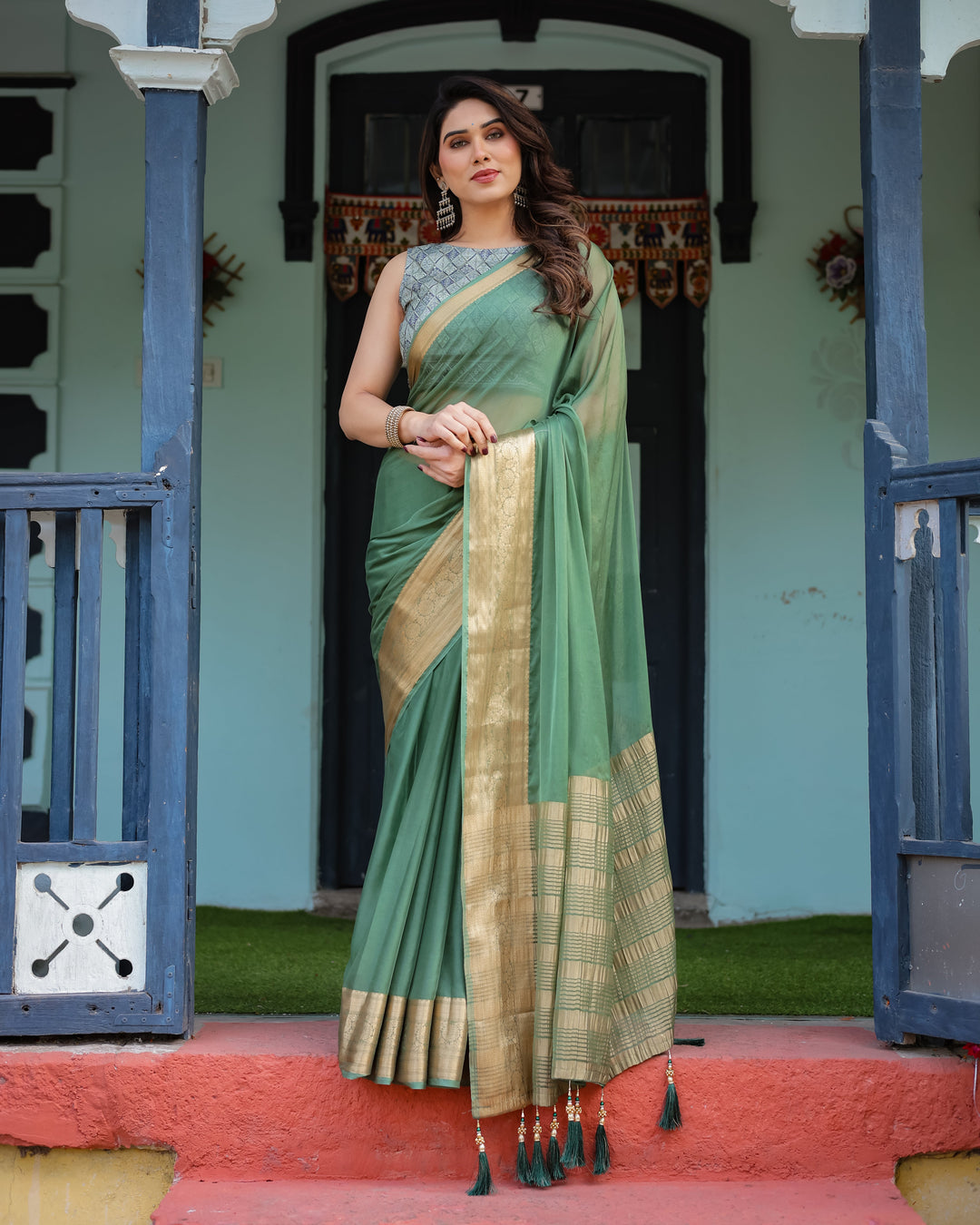 Mint Green Plain Chiffon Saree with Gold Zari Border Geometric Printed Blouse & Tassel Detailing CHIFFON H 128-132