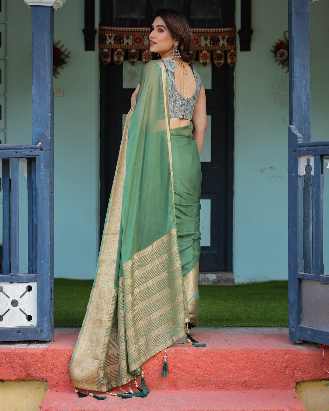 Mint Green Plain Chiffon Saree with Gold Zari Border Geometric Printed Blouse & Tassel Detailing CHIFFON H 128-132