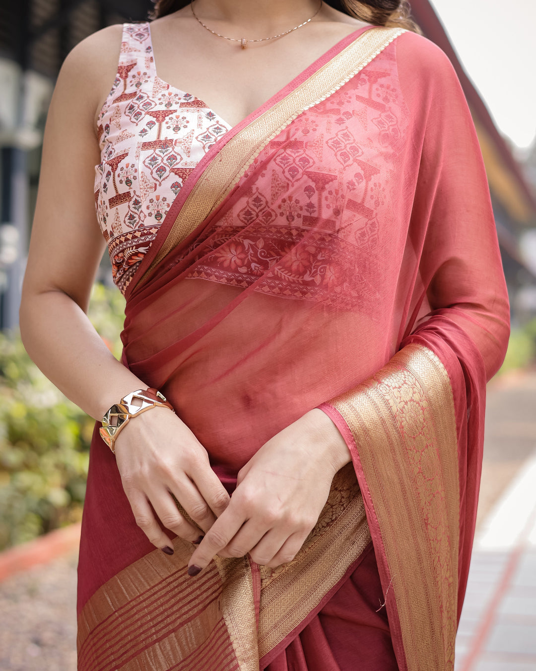 Elegant Maroon Plain Chiffon Saree with Gold Zari Border Designer Printed Blouse & Tassel Detailing CHIFFON H 133-137