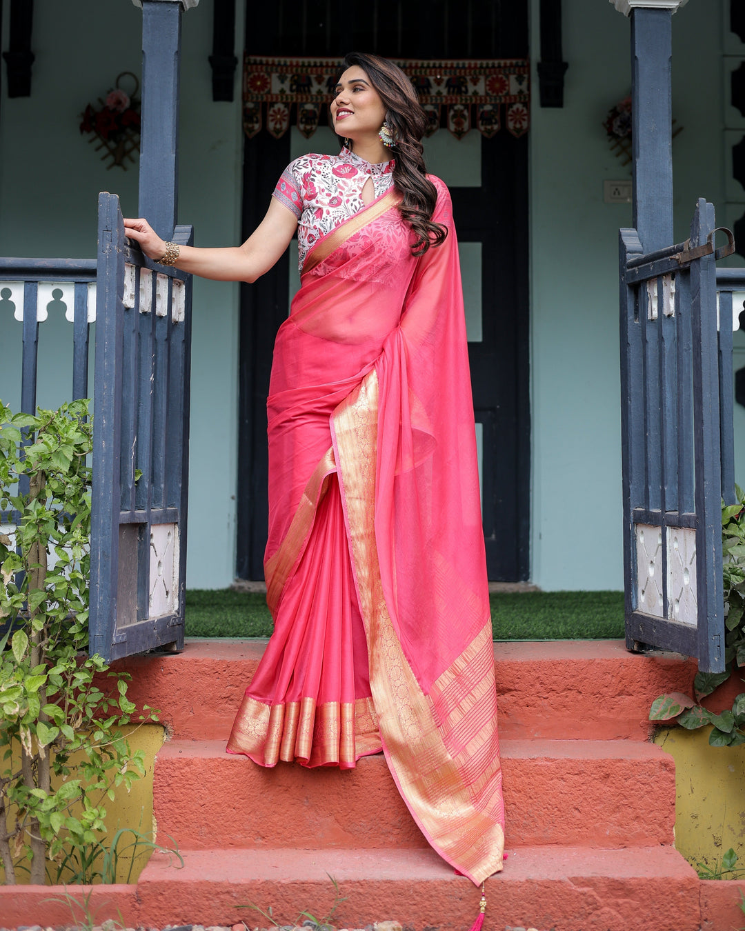 Raspberry Pink Plain Chiffon Saree with Gold Zari Border High-Neck Floral Printed Blouse & Tassel Detailing CHIFFON H