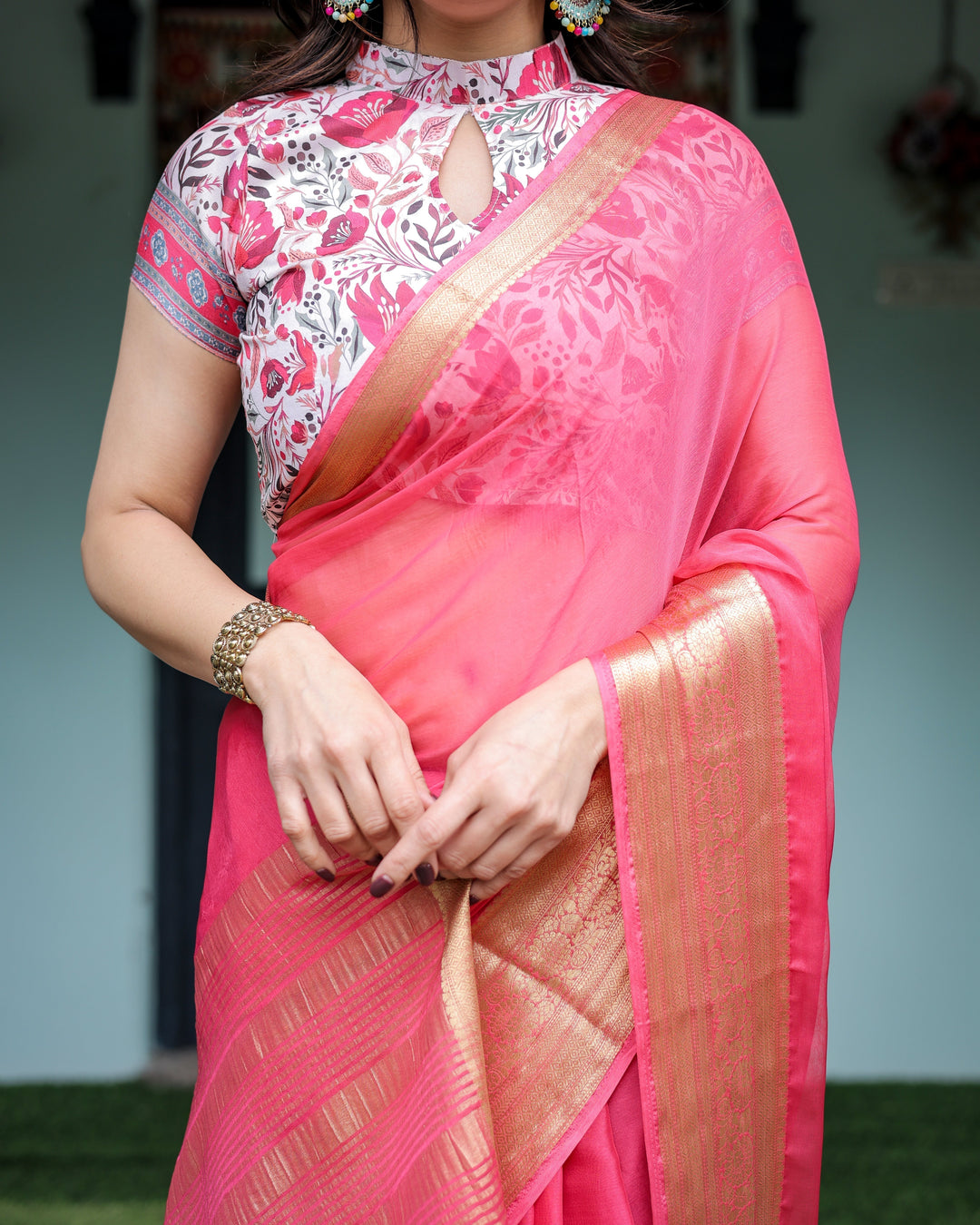 Raspberry Pink Plain Chiffon Saree with Gold Zari Border High-Neck Floral Printed Blouse & Tassel Detailing CHIFFON H