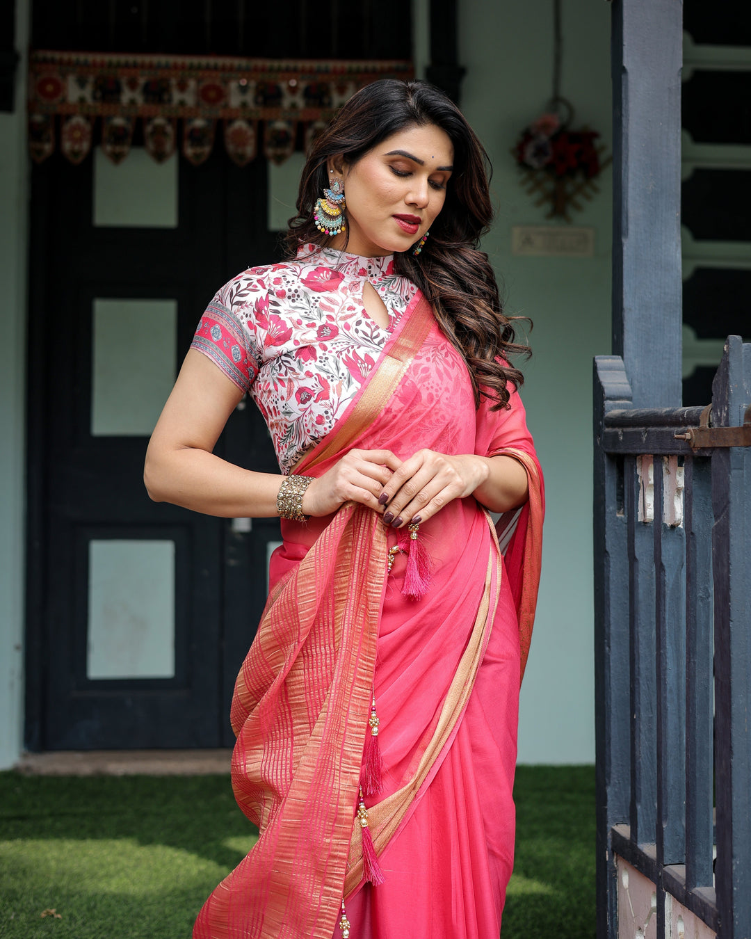 Raspberry Pink Plain Chiffon Saree with Gold Zari Border High-Neck Floral Printed Blouse & Tassel Detailing CHIFFON H