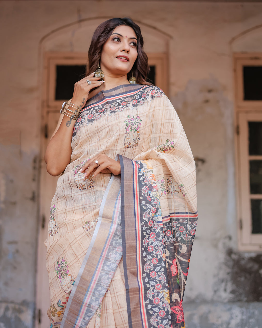 Designer Beige Saree with Contrast Black Pallu & Exquisite Ethnic Patterns