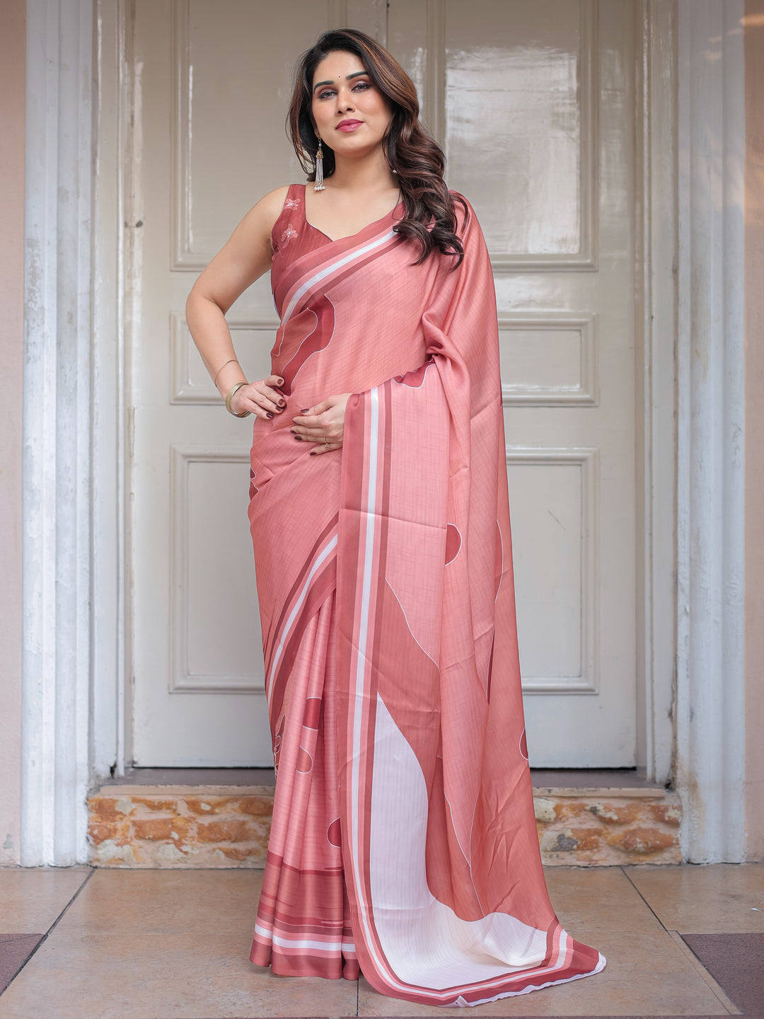 Coral Peach Minimal Floral Satin Georgette Saree with Soft Border & Unstitched Blouse – Elegant Day & Occasion Wear
