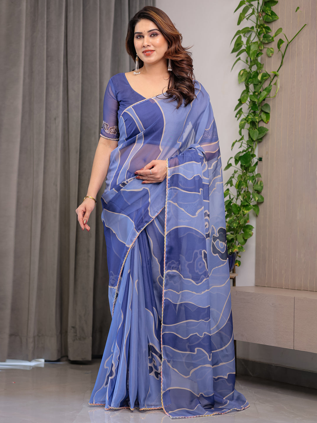 Elegant Steel Blue Printed Organza Saree with Abstract Wave Motifs & Multicolour Lace Border | Designer Lightweight Organza Saree with Attached Blouse Piece | Contemporary Festive Wear Saree