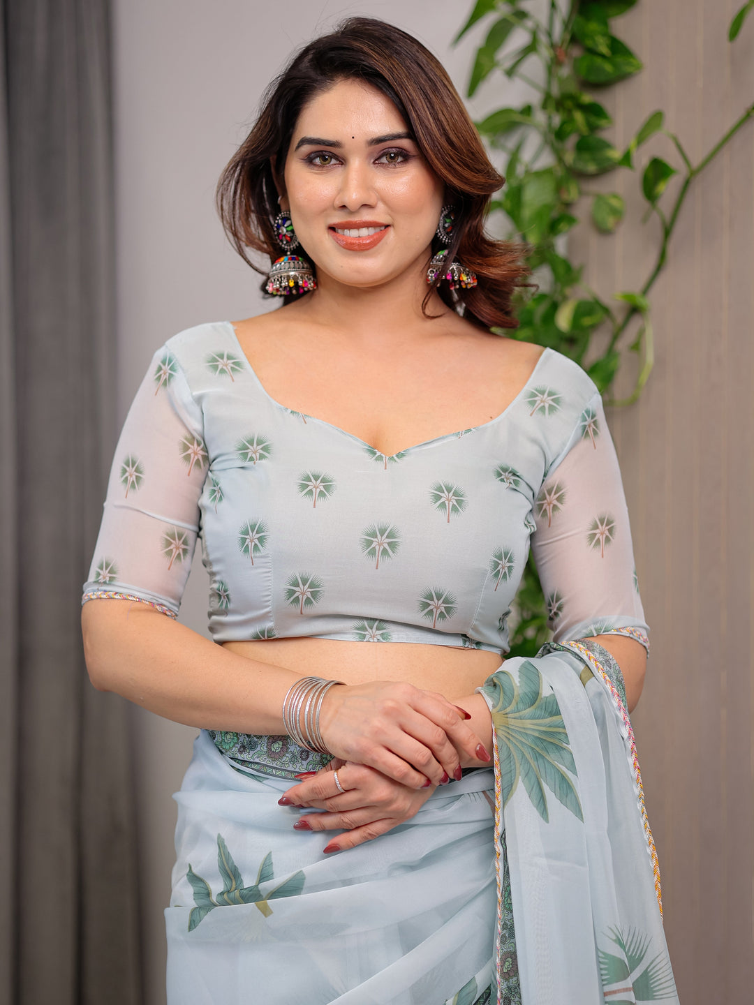 Pastel Mint Green Printed Organza Saree with Tropical Leaf Motifs | Designer Lightweight Sheer Organza Saree with Attached Blouse Piece | Elegant Festive & Day Party Saree