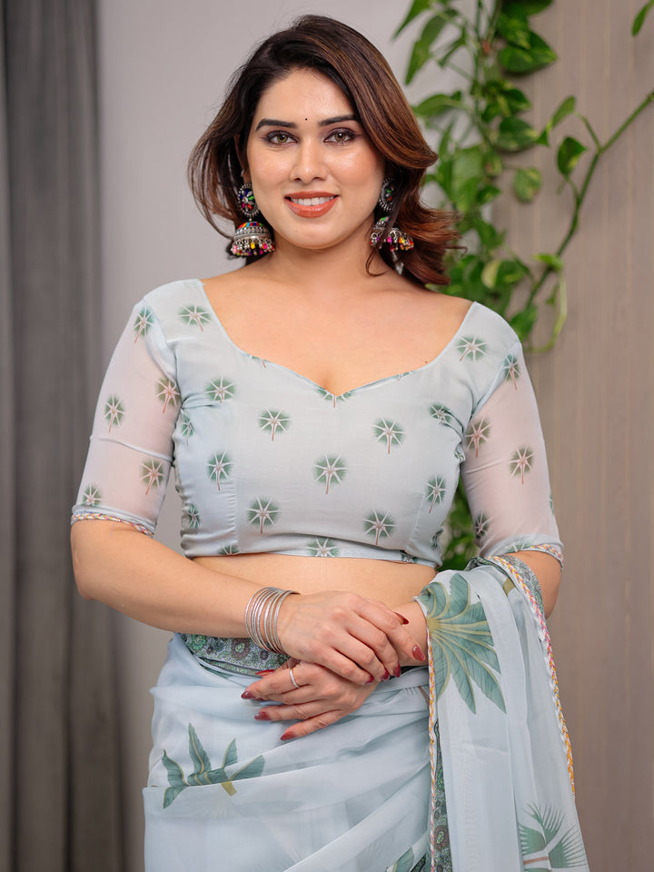 Pastel Mint Green Printed Organza Saree with Tropical Leaf Motifs | Designer Lightweight Sheer Organza Saree with Attached Blouse Piece | Elegant Festive & Day Party Saree