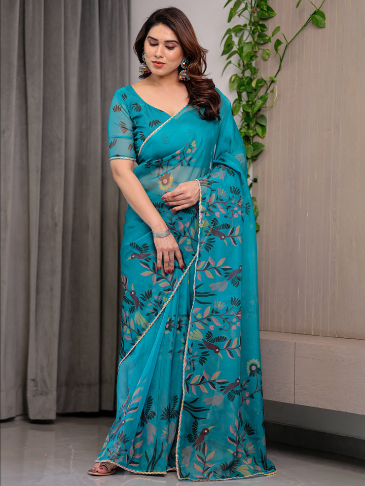 Teal Green Printed Organza Saree with Floral & Bird Motifs and Multicolour Lace Border | Designer Lightweight Organza Saree with Attached Blouse Piece | Elegant Festive & Party Wear Saree