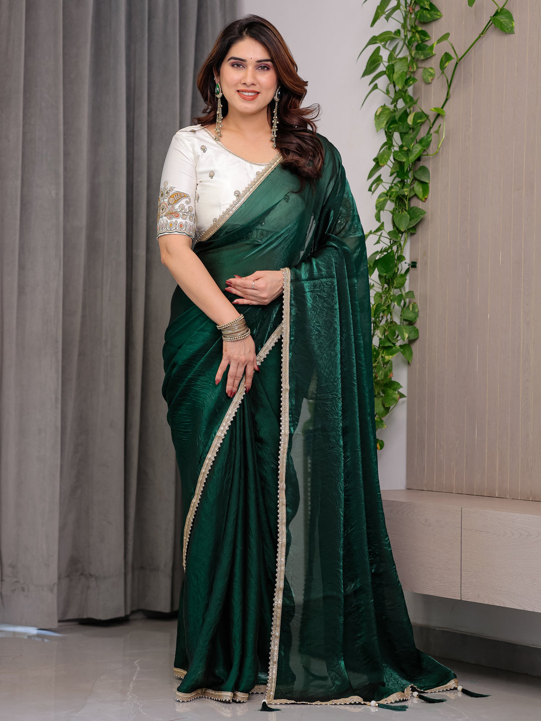 Emerald Bottle Green Fendy Satin Saree with Pearl Lace Border & Tassel Pallu | Premium Shimmer Satin Saree with Heavy Embroidered Designer Blouse | Zari Floral Paisley Embroidery Blouse Festive Saree
