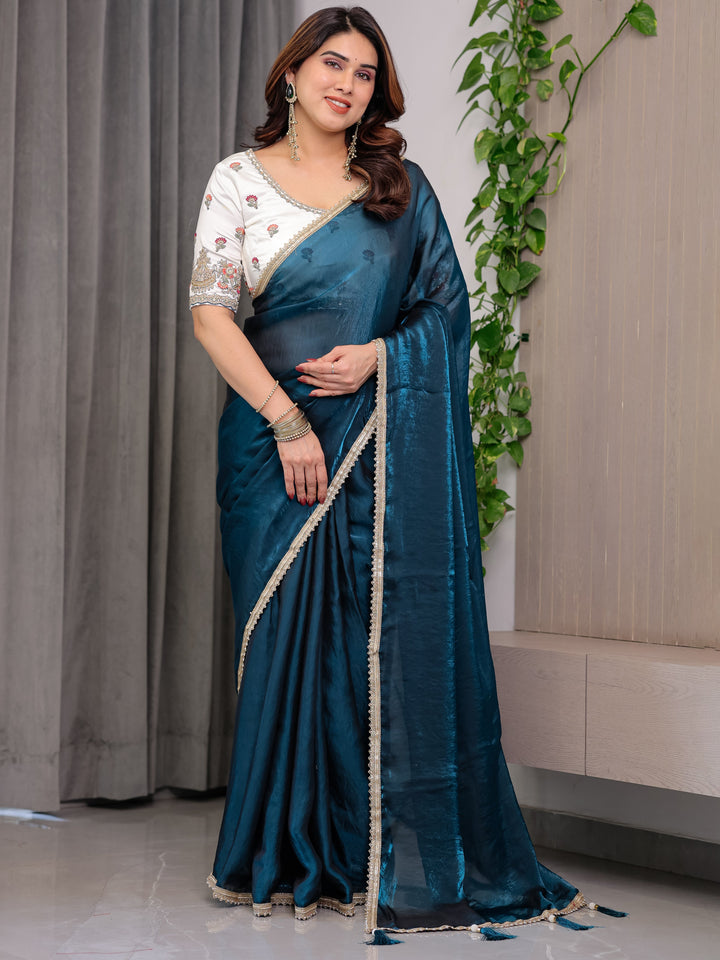 Deep Teal Fendy Satin Designer Saree with Pearl Lace Border & Tassel Pallu | Premium Shimmer Satin Saree with Heavy Floral Embroidered Ivory Blouse | Wedding & Festive Wear Saree