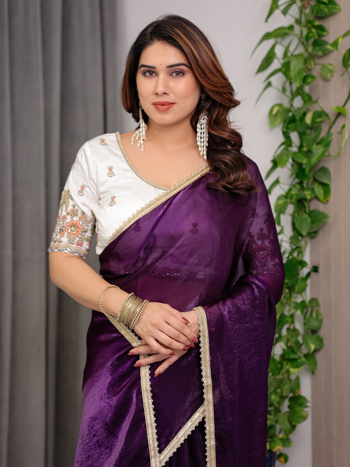 Royal Plum Purple Fendy Satin Designer Saree with Pearl Lace Border & Tassel Pallu | Premium Shimmer Satin Saree with Heavy Floral Embroidered Ivory Blouse | Wedding & Festive Wear Saree