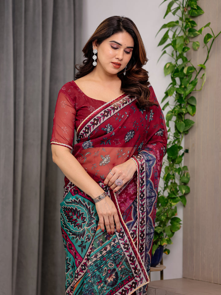 Wine Red Designer Printed Organza Saree with Multicolor Ethnic Paisley Border | Lightweight Floral Printed Party Wear Saree with Attached Blouse Piece | Festive & Wedding Wear Saree
