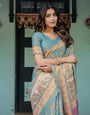 Turquoise Blue Handloom Cotton Saree with Multicolor Floral Pallu & Peach Border
