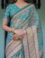 Teal Green Handloom Cotton Saree with Floral Print & Royal Bridal Procession Pallu
