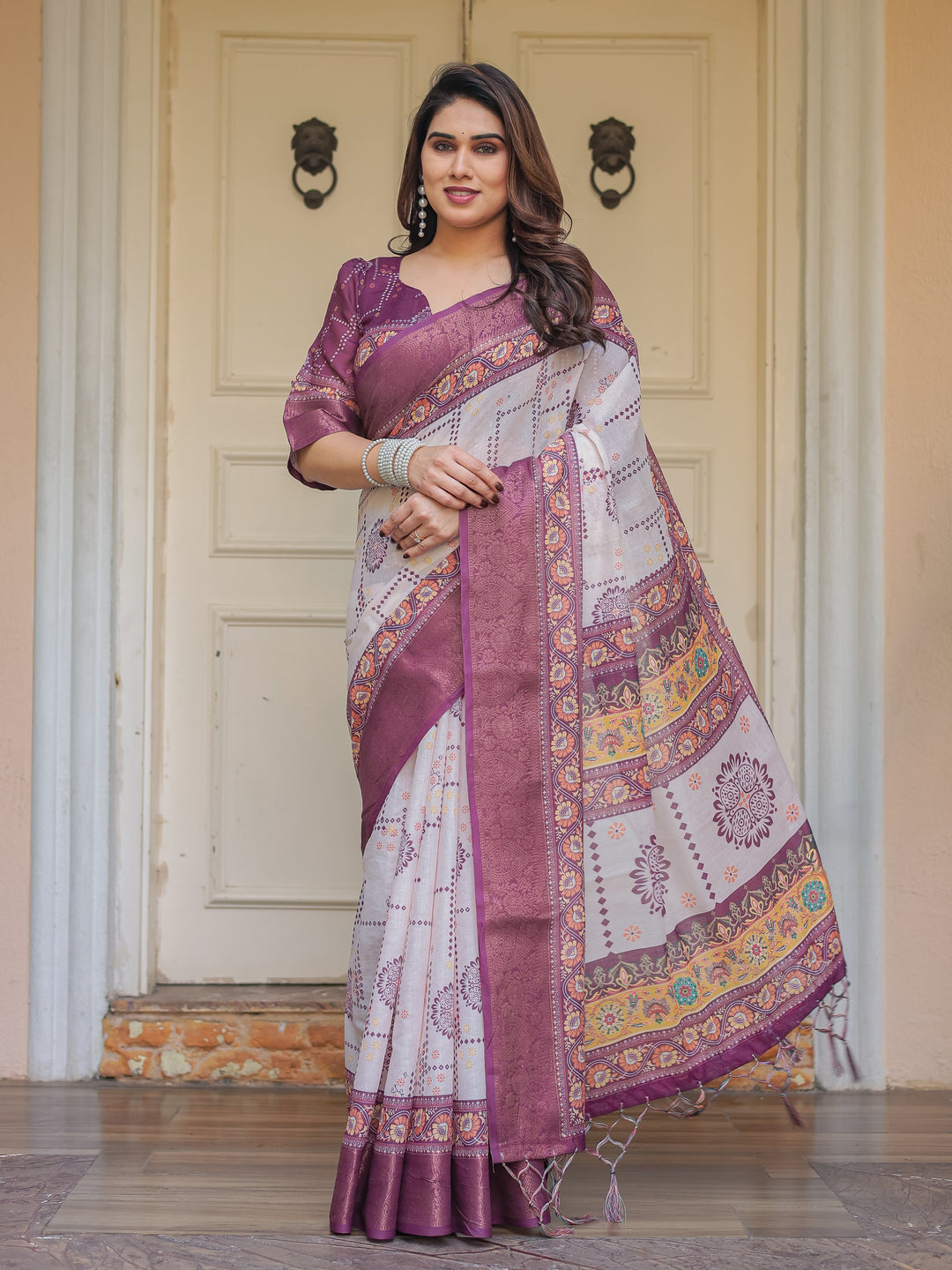 Wine Purple Handloom Cotton Printed Saree with Floral Panel Pallu, Ornamental Border & Tassels – Festive Ethnic Wear
